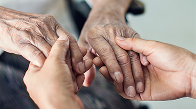two people holding hands